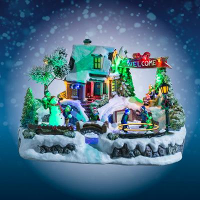 Pueblo navideño "Pista de hielo" luminoso y musical - 143010