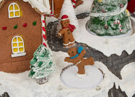 Pueblo navideño de jengibre animado/musical con 25 LED y transformador