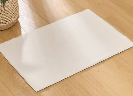 Alfombra "Couka" de piel sintética blanca de 90x60 cm - 212437