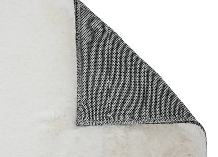 Alfombra "Couka" de piel sintética blanca de 90x60 cm - 212437